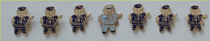 (Lot of 7) police pig 1" lapel pins with butterfly clutches